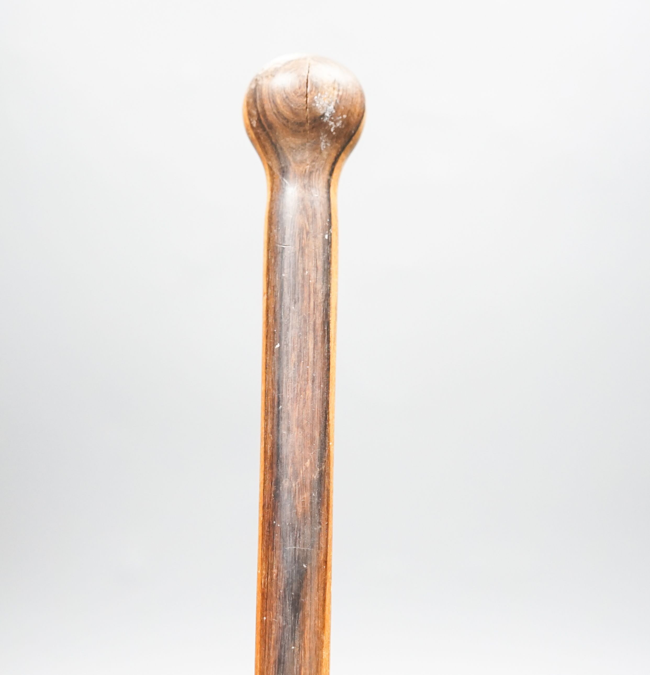 An ebony walking cane